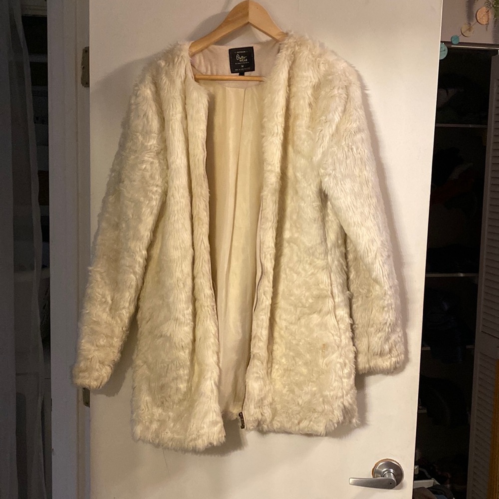 White faux fur zip up coat